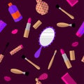 Seamless pattern: women`s accessories and cosmetics on a purple background. Mirror, perfume, lipstick, brushes, cream Royalty Free Stock Photo